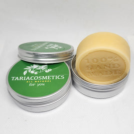 Top-down view of an aluminum tin with a green circular label reading 